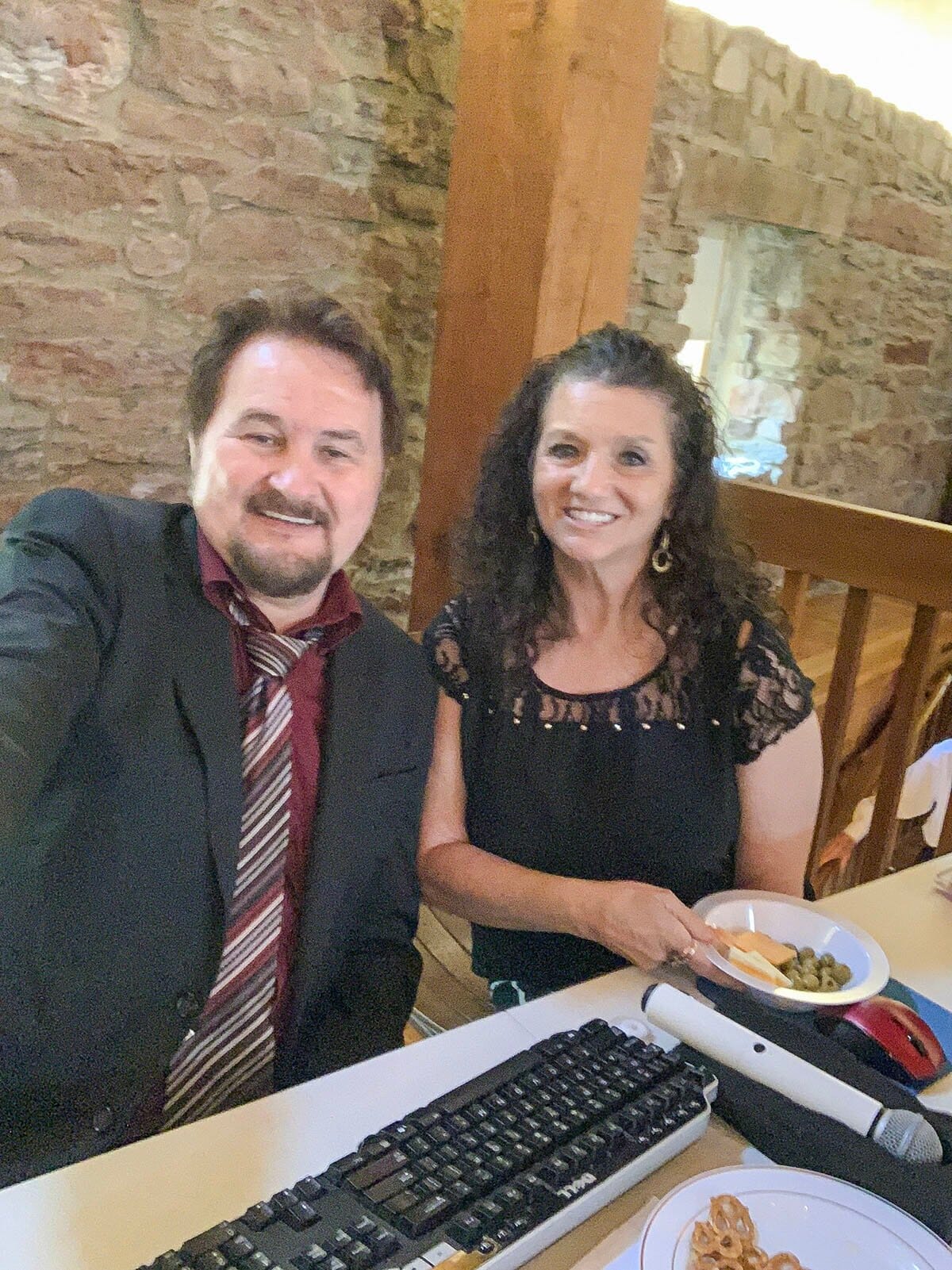 Eddie and Arlene Crunk at their DJ booth inside the Rapp-Owen Granary in New Harmony, Indiana